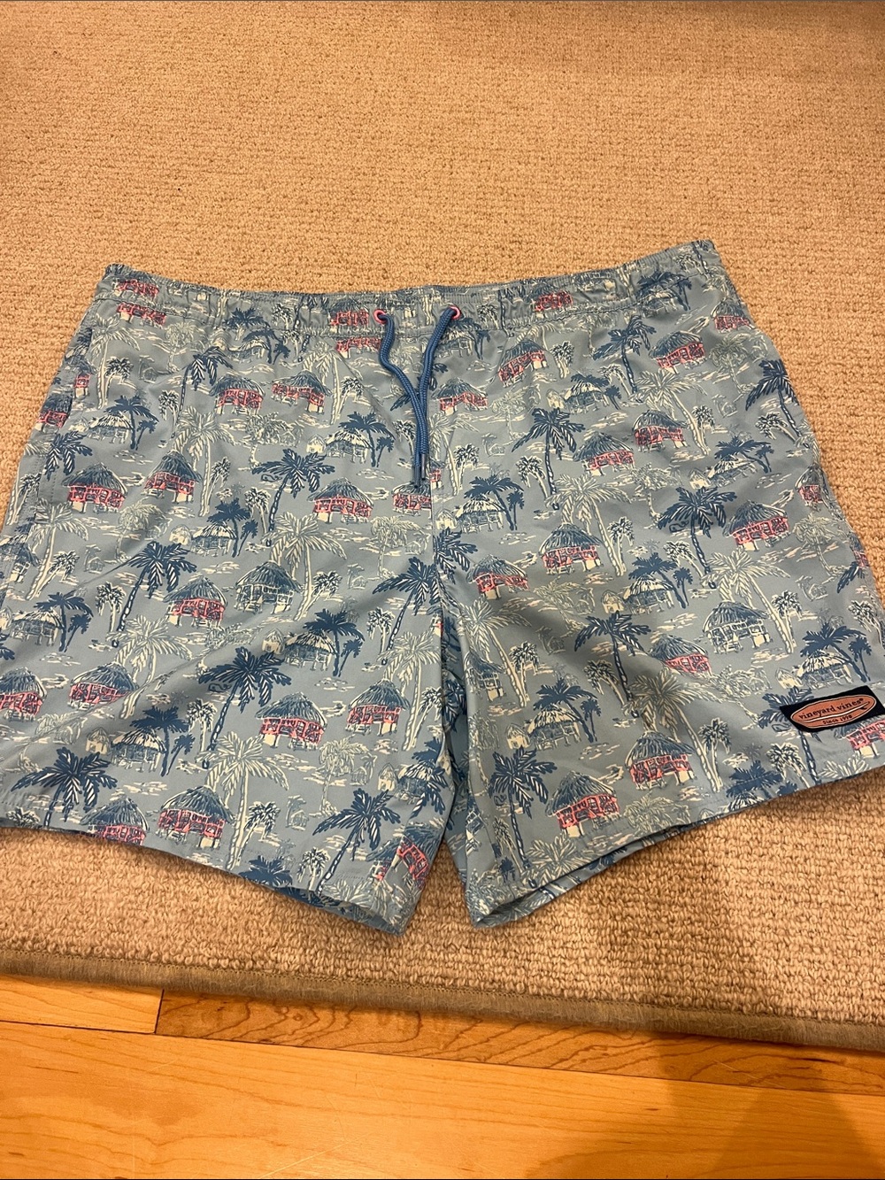 Vineyard Vines Blue Palm & Hut Print Swim Trunks
Size: LG